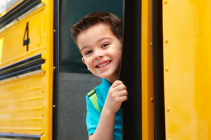 Child boarding school bus